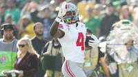 Ohio State Buckeyes wide receiver Jeremiah Smith (4) scores a touchdown during the first half of the College Football Playoff quarterfinal against the Oregon Ducks at the Rose Bowl in Pasadena, Calif. on Jan. 1, 2025.