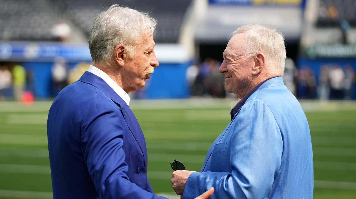 Los Angeles Rams owner Stan Kroenke (left) talks with Dallas Cowboys owner Jerry Jones during the game at SoFi Stadium.