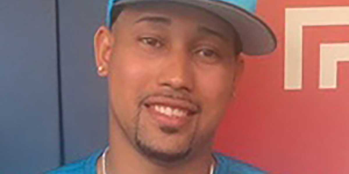 Jhoan Duran speaks with the media in the Phillies' dugout Aug. 1, 2025, before his first game since being traded for Minnesota