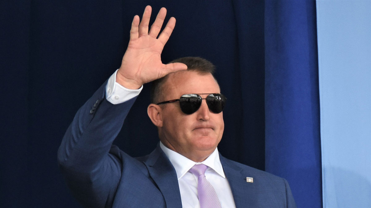Jim Thome acknowledges the crowd during the introduction of returning inductees at the National Baseball Hall of Fame's 2024 induction ceremony.