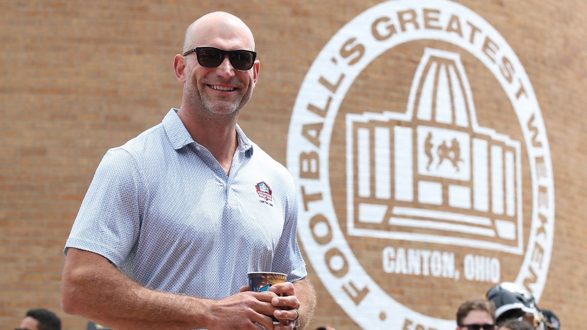 Hall of Fame member Joe Thomas enters the ceremonies at the Pro Football Hall of Fame-Class of 2025 enshrinement ceremonies at Tom Benson Hall of Fame Stadium.