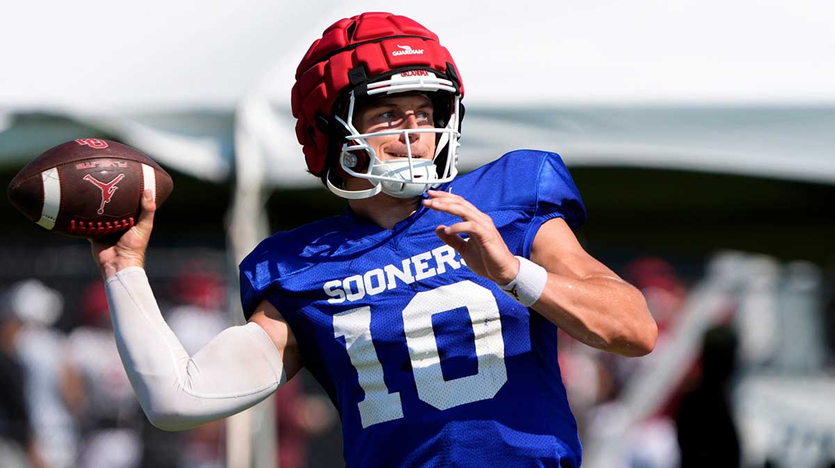 Oklahoma quarterback John Mateer throws a pass during practice in Norman, Okla.