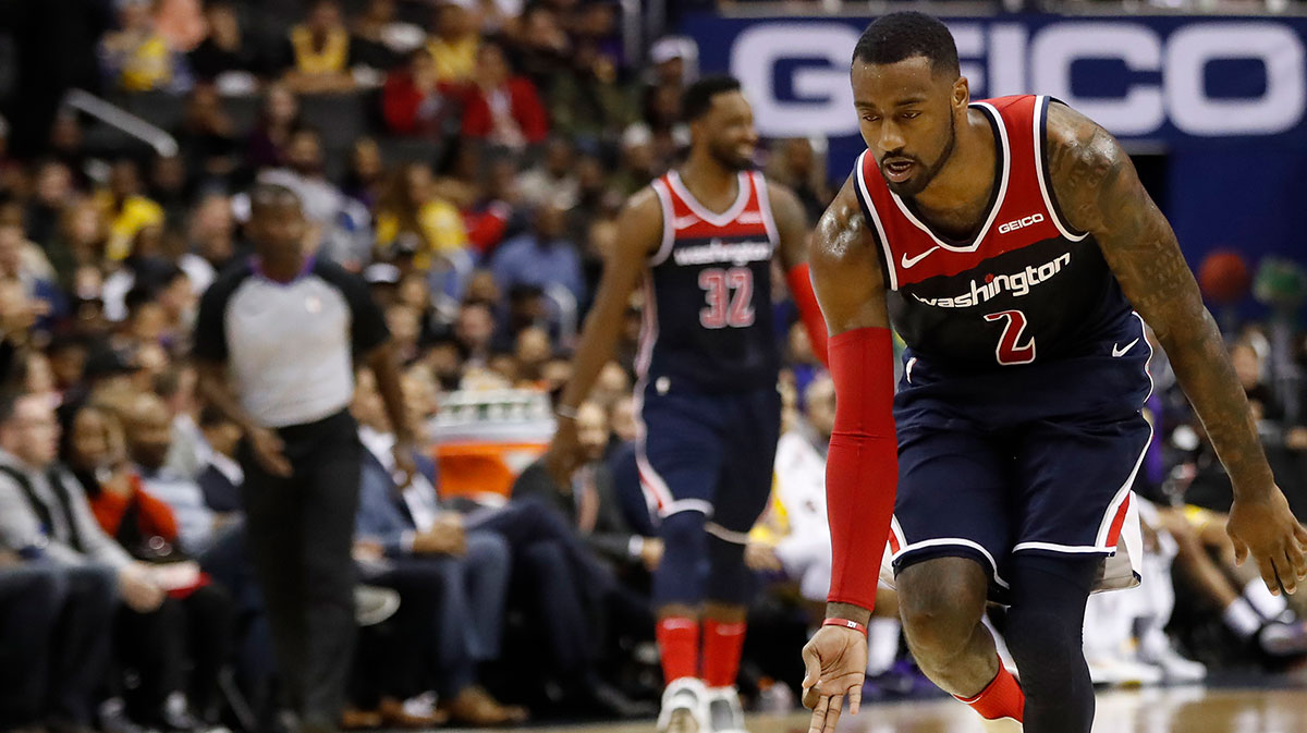 Washington Wizards guard John Wall (2) celebrates after scoring his fortieth point against the Los Angeles Lakers in the fourth quarter at Capital One Arena. The Wizards won 128-110.