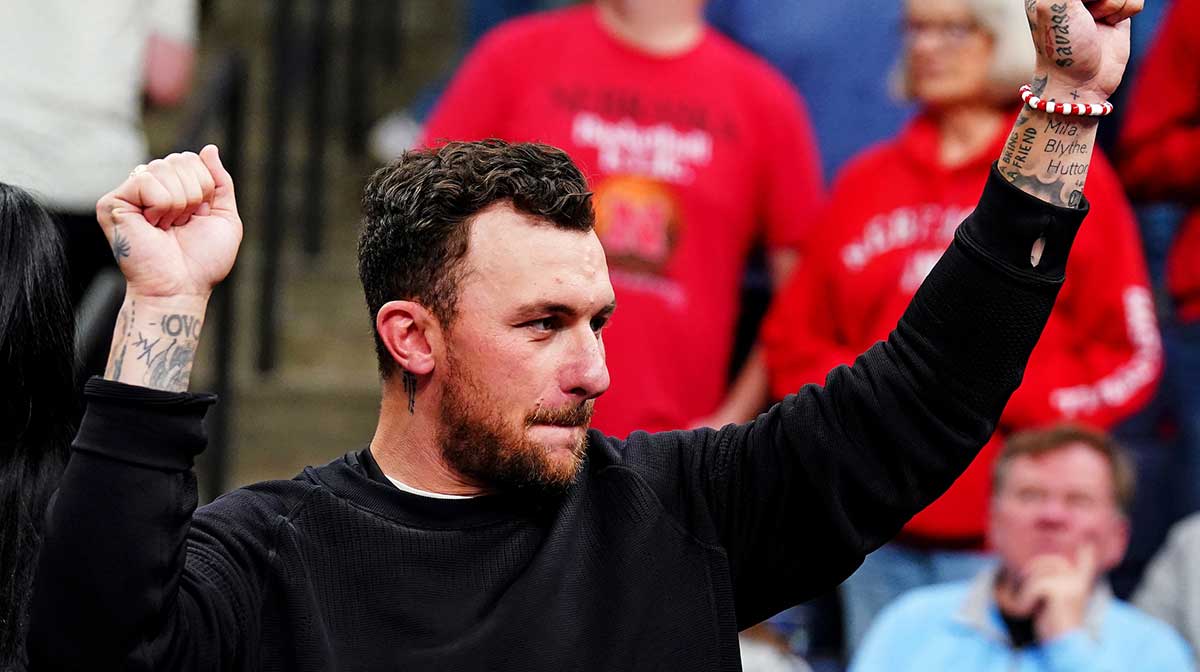 Texas A&M Aggies former quarterback Johnny Manziel watches the between the Texas A&M Aggies and the Nebraska Cornhuskers in the first round of the 2024 NCAA Tournament at FedExForum.