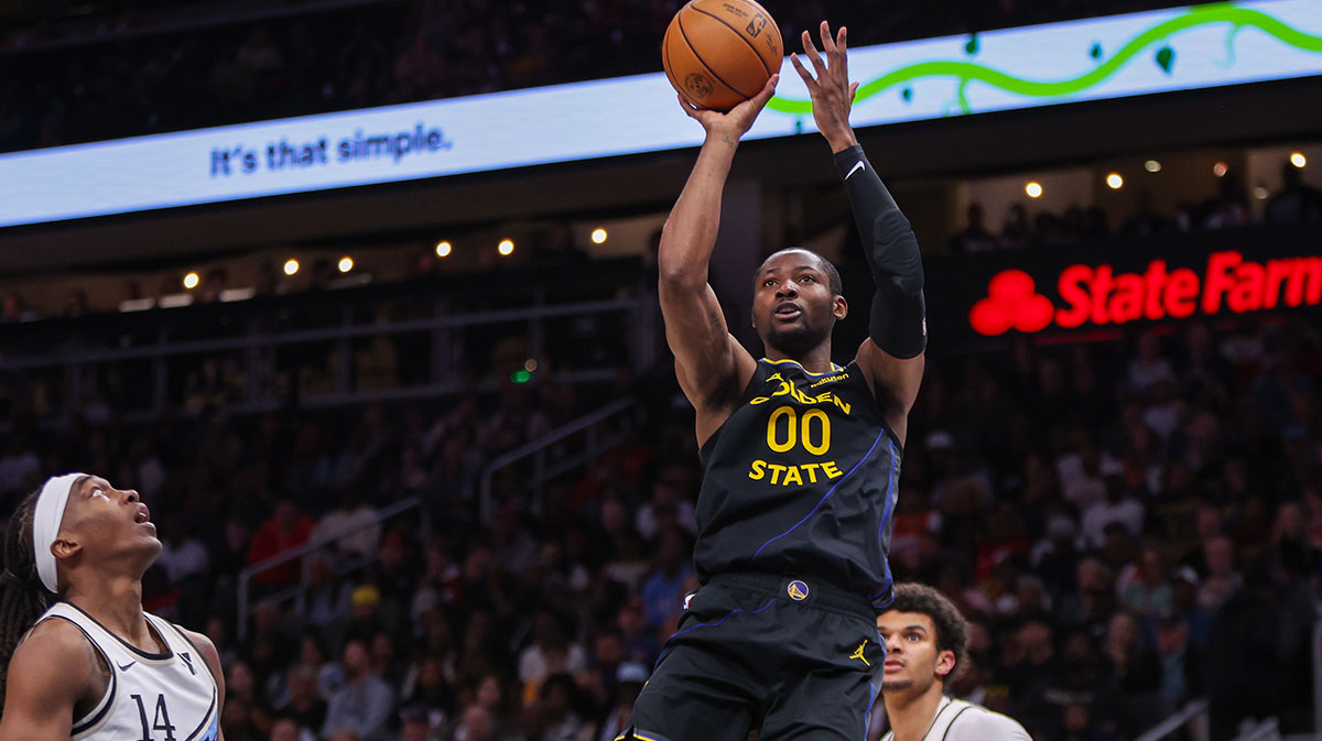 Golden State Warriors forward Jonathan Kuminga (00) shoots against the Atlanta Hawks in the third quarter at State Farm Arena.