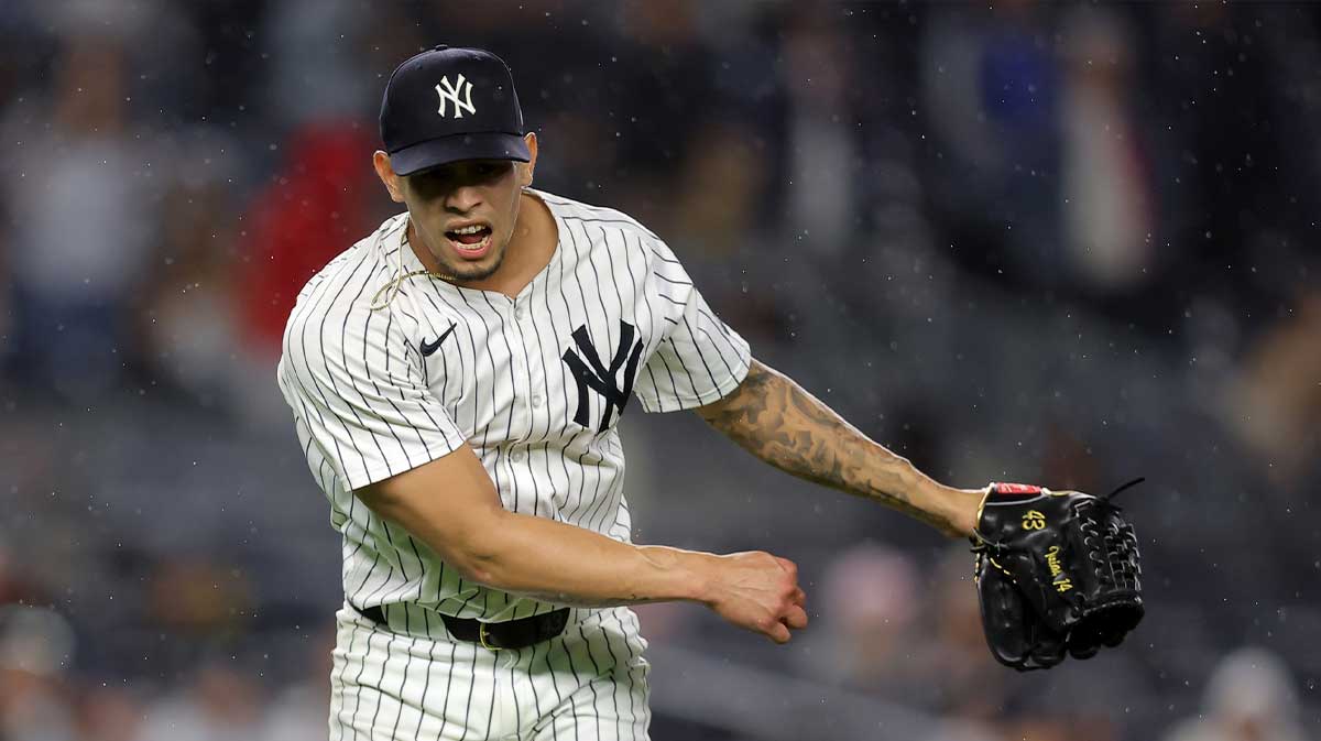 New York Yankees relief pitcher Jonathan Loaisiga (43) reacts after giving up the go ahead run during the eleventh inning against the Los Angeles Angels at Yankee Stadium.
