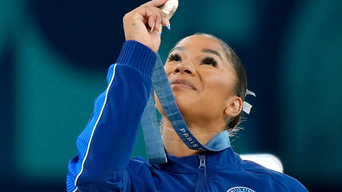 Jordan Chiles of the United States celebrates her bronze medal on the floor exercise on day three of the gymnastics event finals during the Paris 2024 Olympic Summer Games.