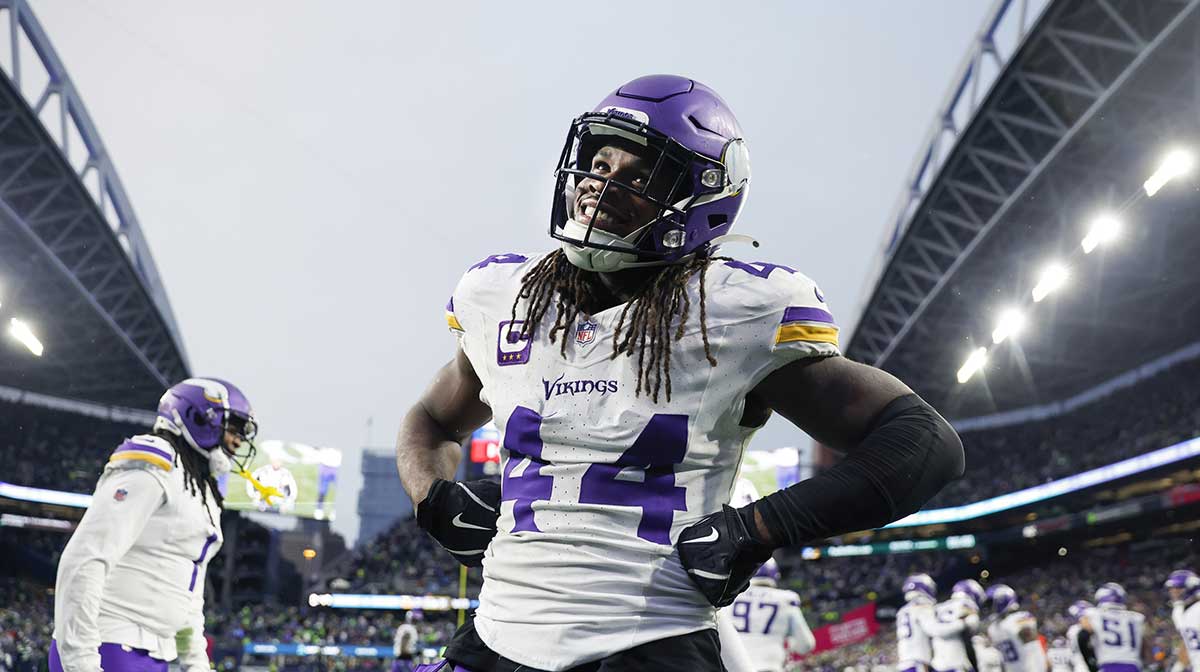 Minnesota Vikings safety Josh Metellus (44) poses for a photo following a Seattle Seahawks turnover during the fourth quarter at Lumen Field.