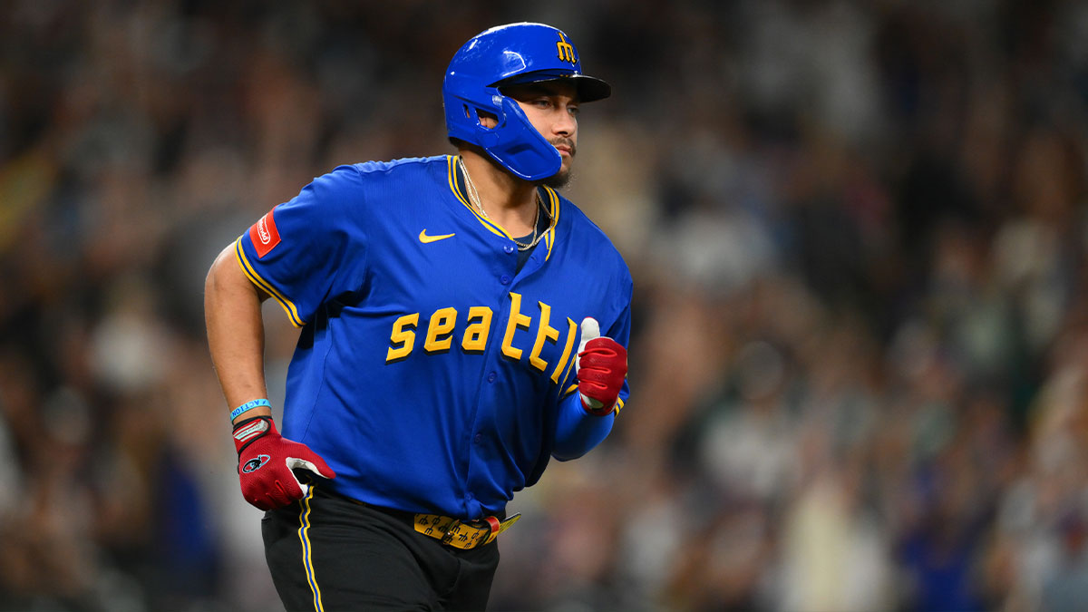 Seattle Mariners first baseman Josh Naylor (12) runs the bases after hitting a home run against the Athletics during the seventh inning at T-Mobile Park.