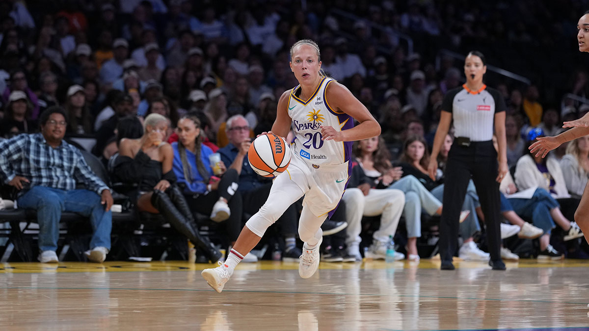 LA Sparks guard Julie Allemand (20) dribbles against the Connecticut Sun in the second half at Crypto.com Arena.
