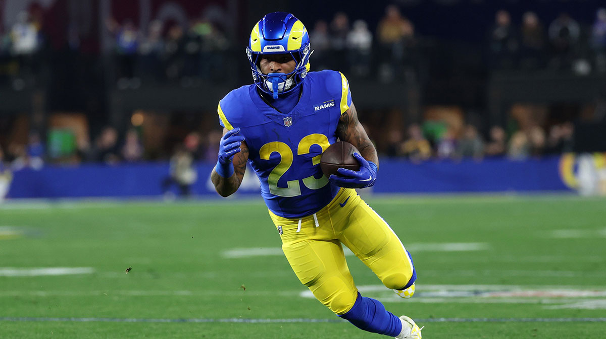 Los Angeles Rams running back Kyren Williams (23) rushes the ball against the Minnesota Vikings during the first half in an NFC wild card game at State Farm Stadium.