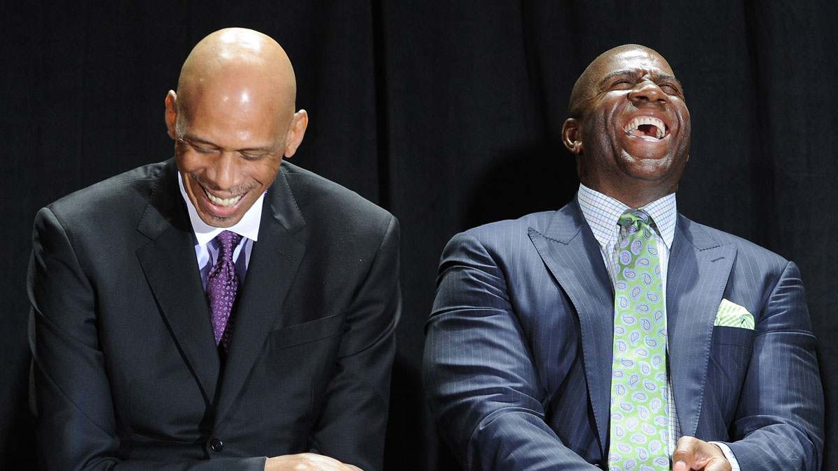 NBA players Kareem Abdul-Jabbar and Irvin "Magic" Johnson on stage during the ceremony unveiling the Kareem Abdul-Jabbar statue in front of the Staples Center.