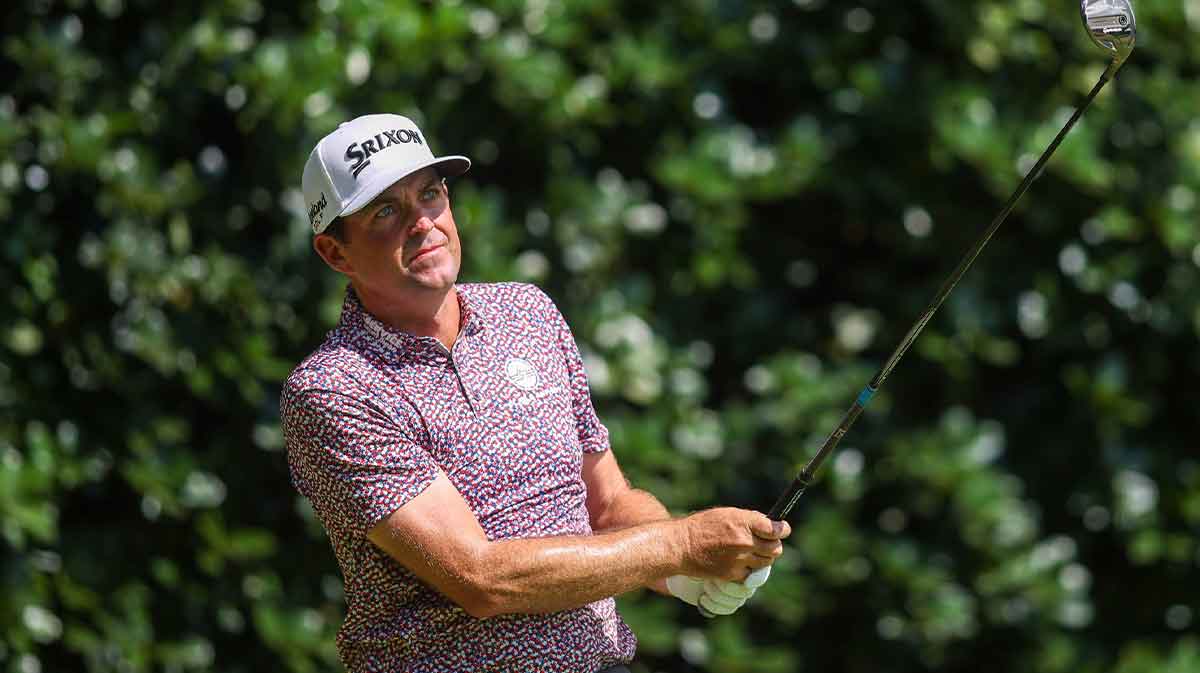 Keegan Bradley plays his shot from the 12th tee during the final round of the TOUR Championship golf tournament