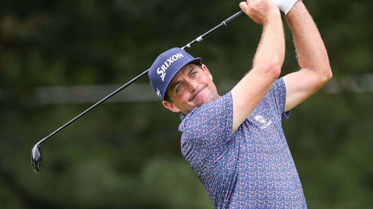 Keegan Bradley plays his shot from the third tee during the third round of the TOUR Championship golf tournament.