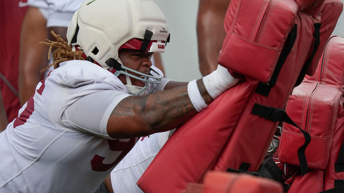 Defensive lineman Tim Keenan III hit the sled during the first practice session of the preseason for the Alabama Crimson Tide.