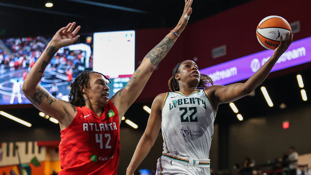 New York Liberty forward Kennedy Burke (22) attempts to shoot against Atlanta Dream center Brittney Griner (42) during the third quarter at Gateway Center Arena at College Park.