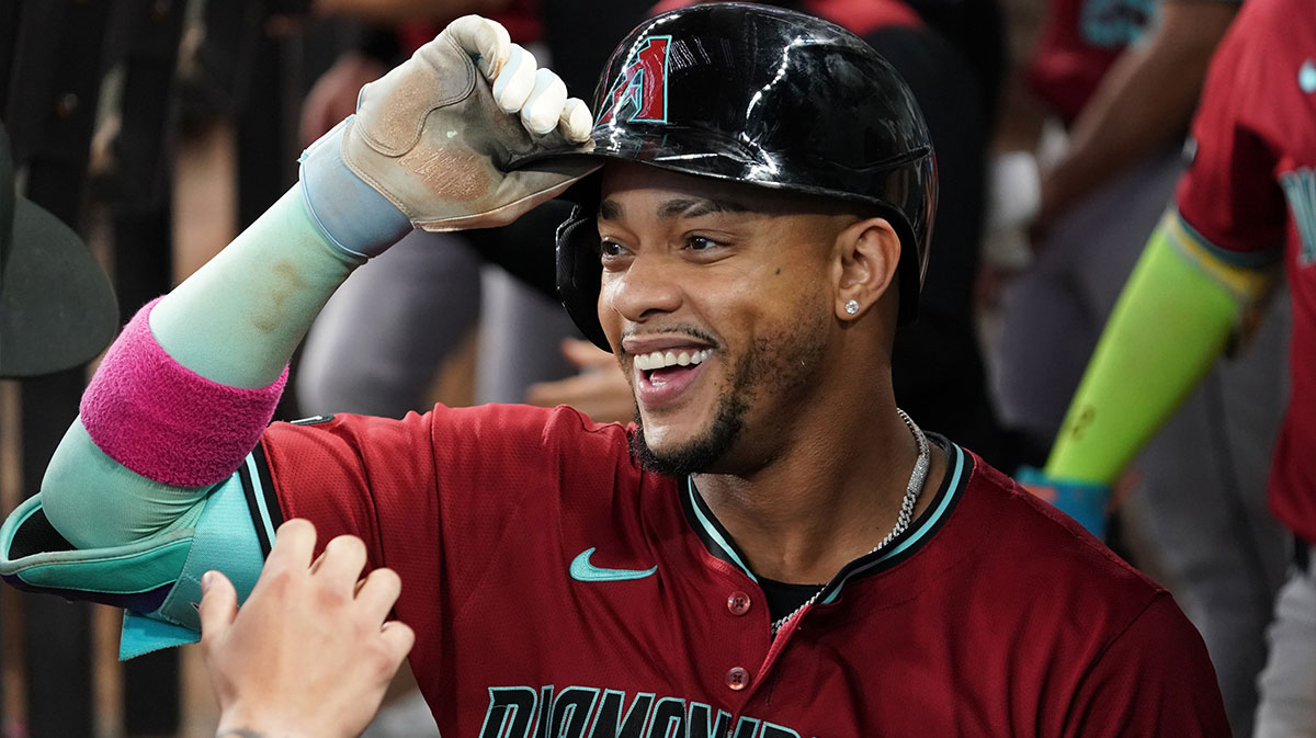 Arizona Diamondbacks second baseman Ketel Marte (4) is greet in the dugout after hitting a three-run home run during the ninth inning against the Texas Rangers at Globe Life Field.
