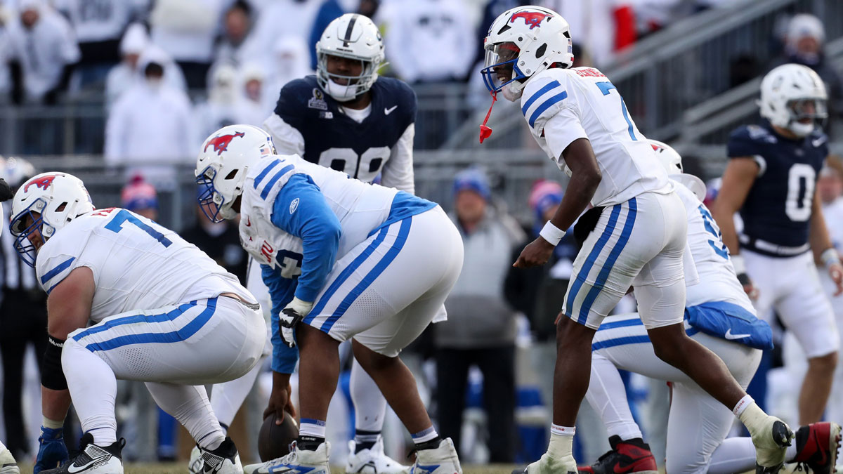 Southern Methodist Mustangs quarterback Kevin Jennings (7) communicates at the line of scrimmage during the third quarter against the Penn State Nittany Lions in the first round of the College Football Playoff at Beaver Stadium.