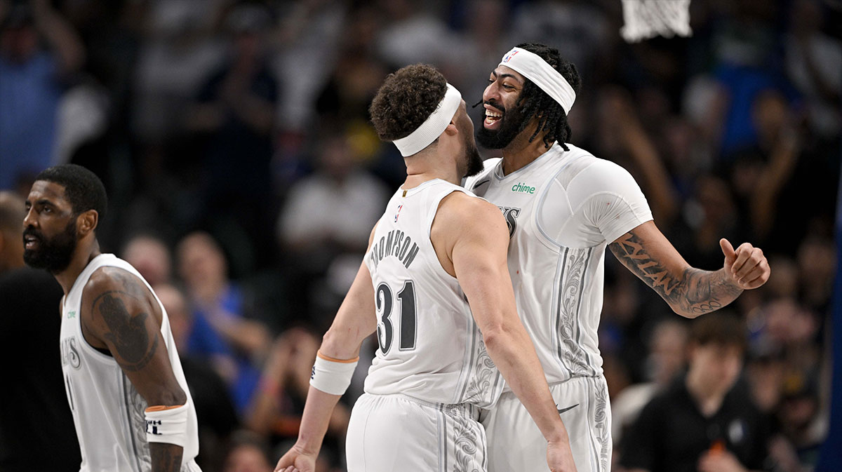 Dallas Mavericks forward Anthony Davis (3) and guard Klay Thompson (31) celebrates after Davis dunks the ball during the game between the Dallas Mavericks and the Houston Rockets at the American Airlines Center.
