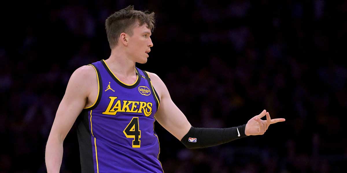 Los Angeles Lakers guard Dalton Knecht (4) reacts after a 3-point basket in the first half against the New Orleans Pelicans at Crypto.com Arena. Mandatory Credit: