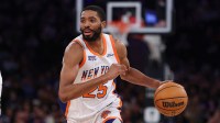 New York Knicks forward Mikal Bridges (25) dribbles up court during the first half against the Washington Wizards at Madison Square Garden.