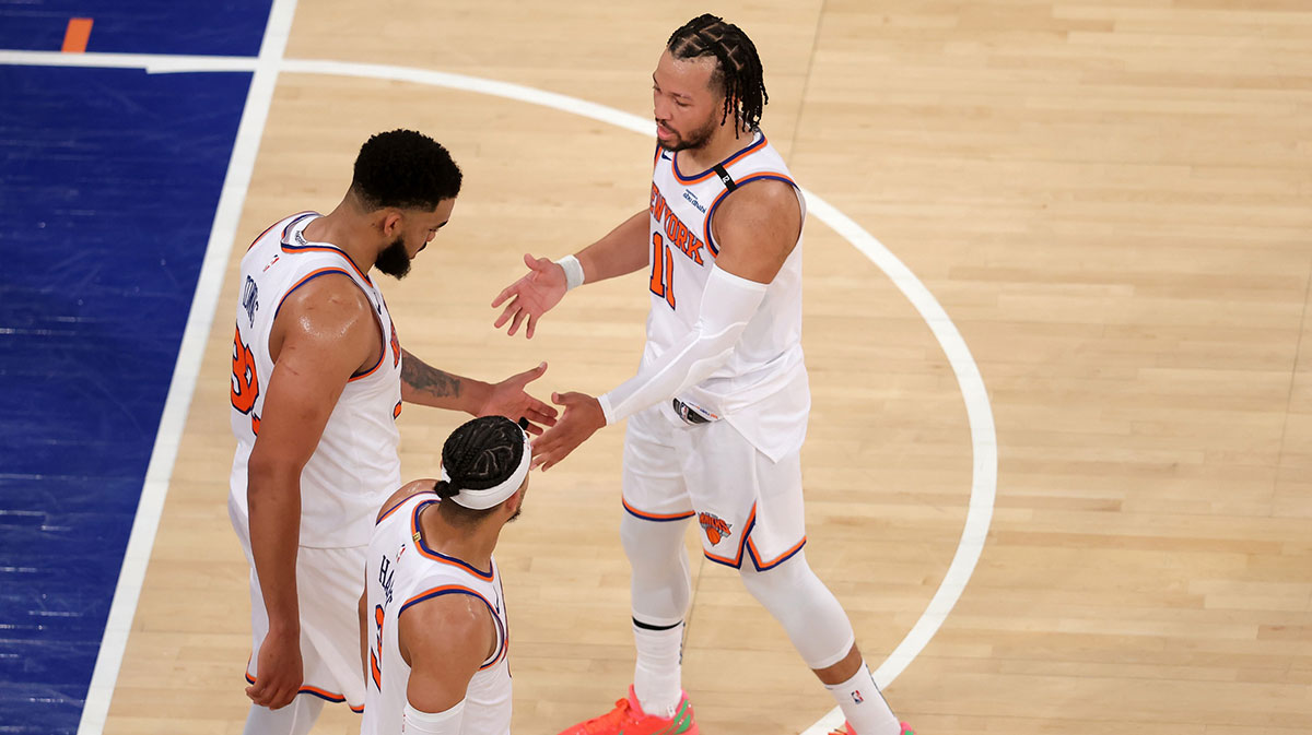 Knicks guard Jalen Brunson (11) and center Karl-Anthony Towns (32) and guard Josh Hart (3) react in the fourth quarter against the Indiana Pacers during game five of the eastern conference finals for the 2025 NBA Playoffs at Madison Square Garden