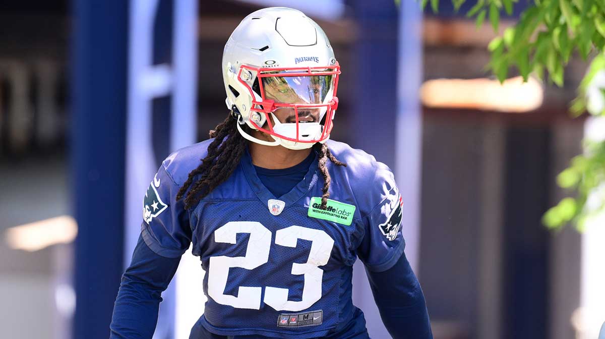 New England Patriots safety Kyle Dugger (23) walks to the practice fields for minicamp at Gillette Stadium.