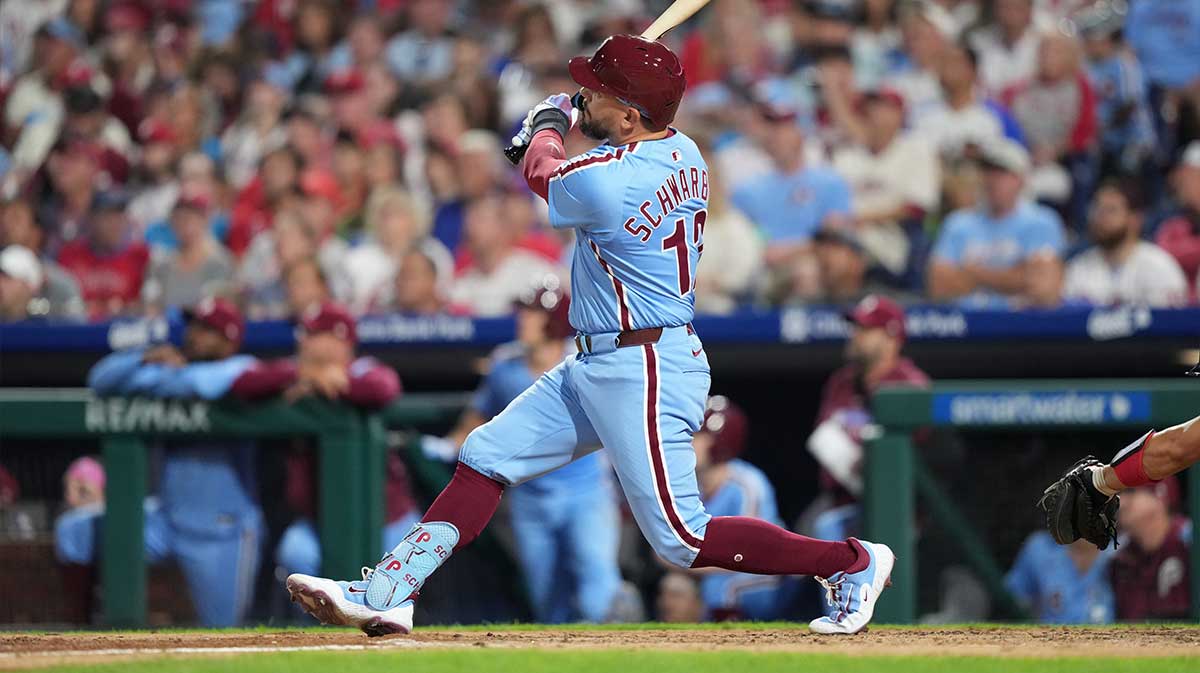 Philadelphia Phillies designated hitter Kyle Schwarber (12) hits a two-run home run against the Atlanta Braves in the fourth inning at Citizens Bank Park.
