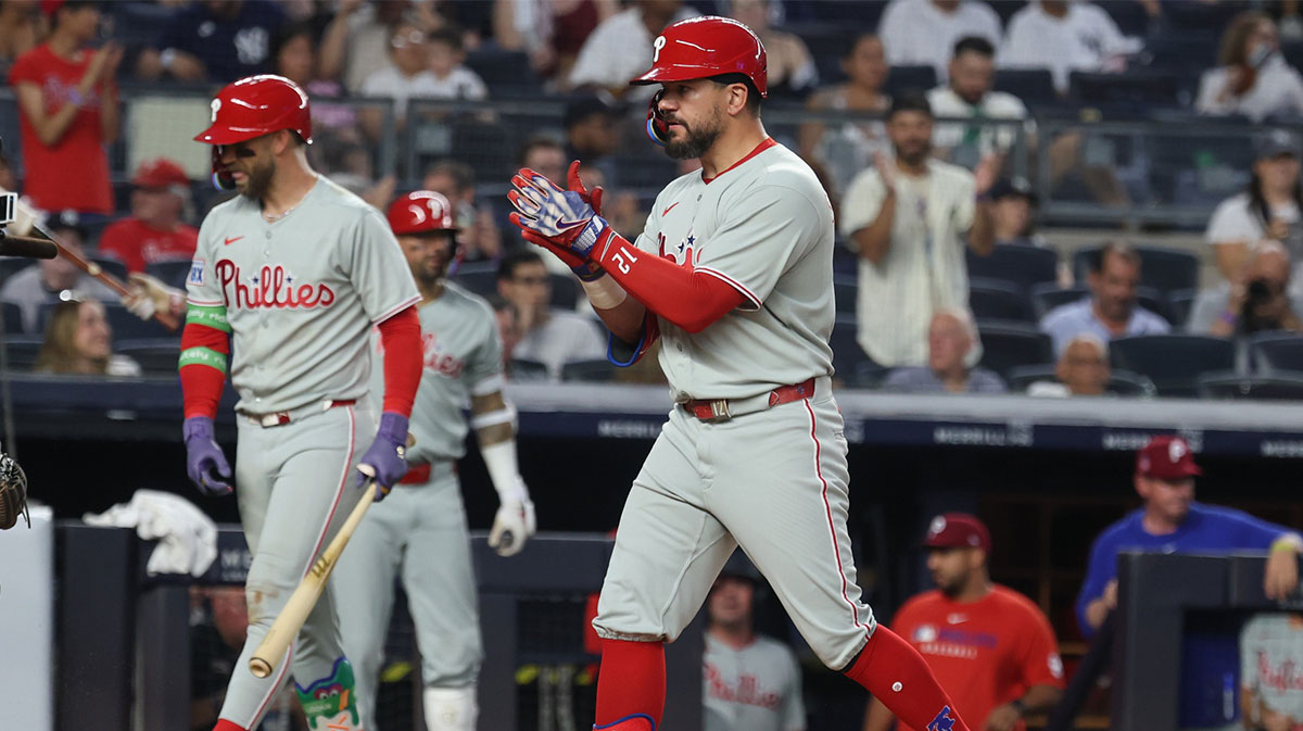 Philadelphia Phillies designated hitter Kyle Schwarber (12) scores after hitting a two run home run during the fifth inning against the New York Yankees at Yankee Stadium.