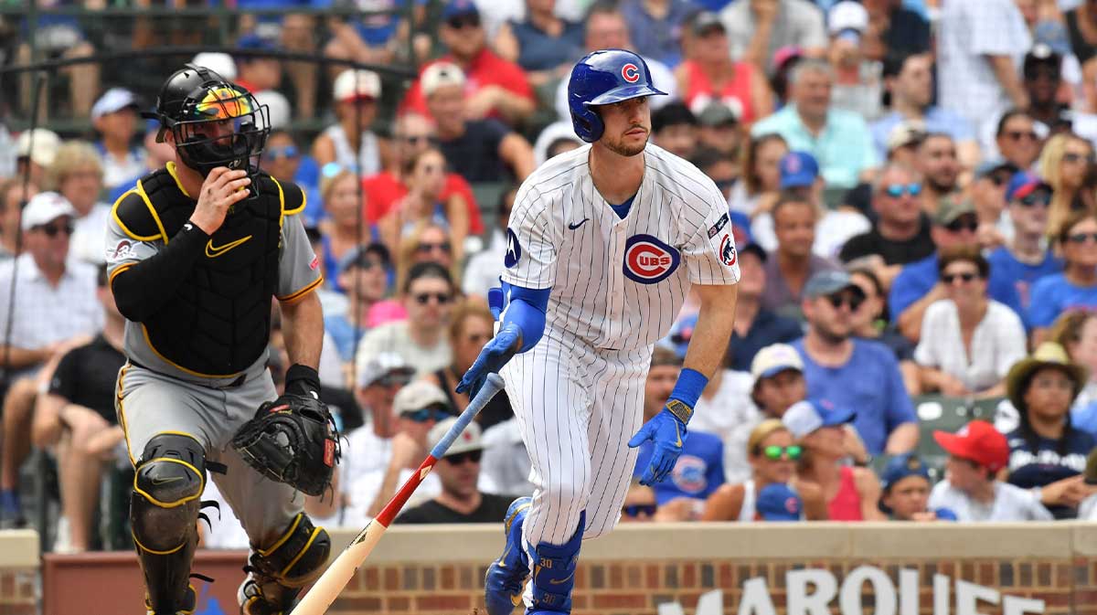 Chicago Cubs right fielder Kyle Tucker (30) hits a single during the eighth inning against the Pittsburgh Pirates at Wrigley Field. 