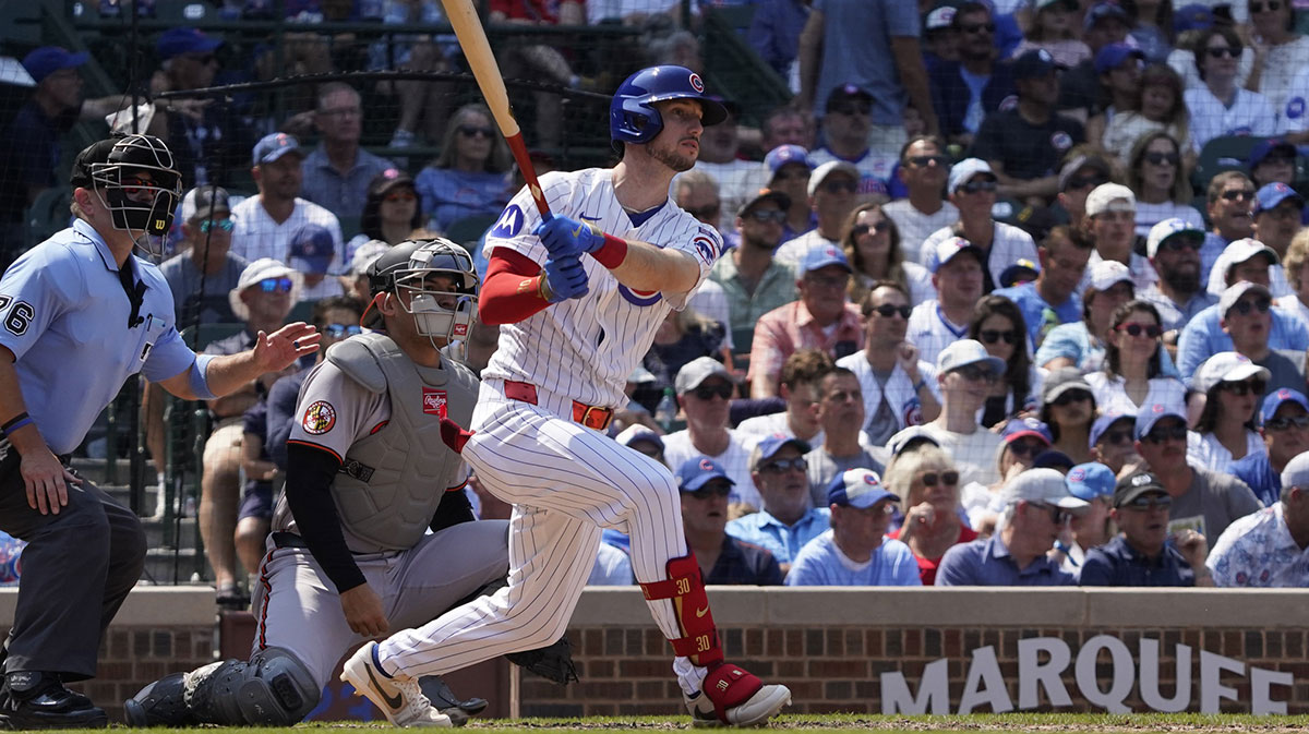Chicago Cubs outfielder Kyle Tucker (30) hits a single against the Baltimore Orioles during the fifth inning