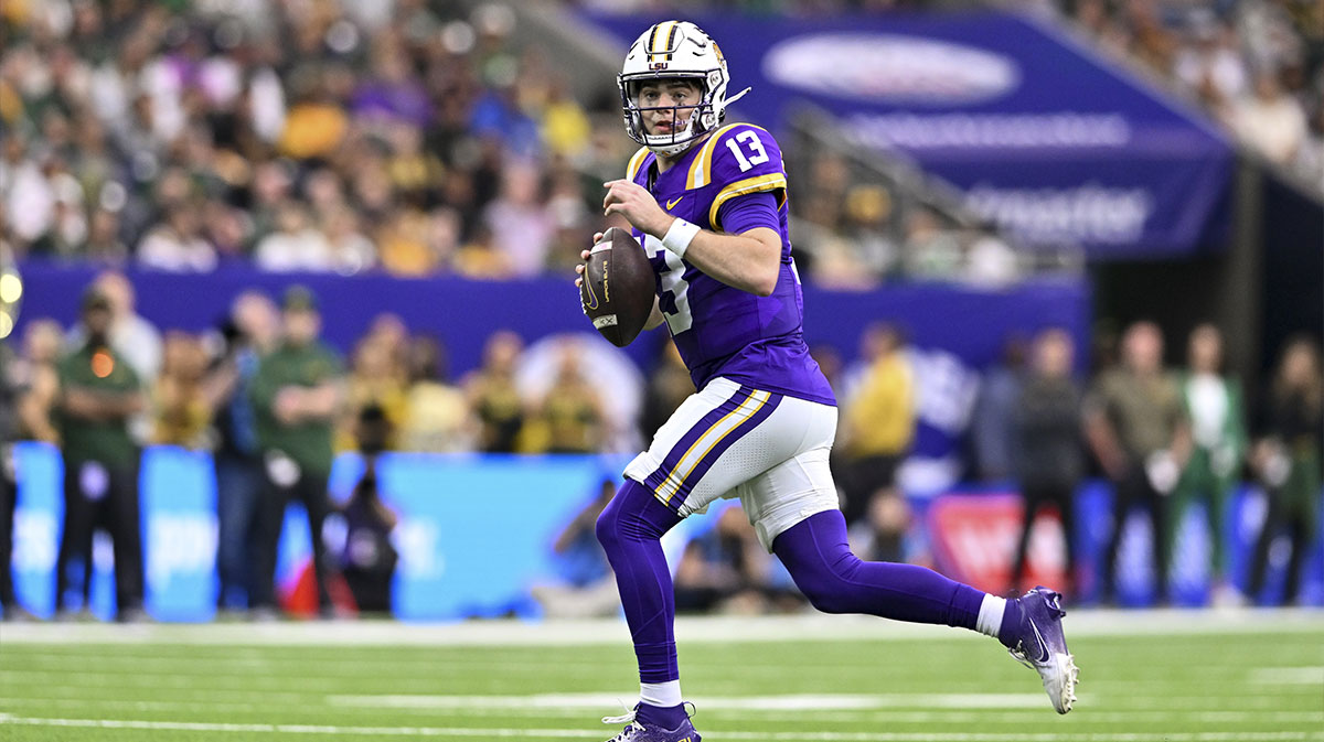 LSU Tigers quarterback Garrett Nussmeier (13) runs the ball during the first half against the Baylor Bears at NRG Stadium.