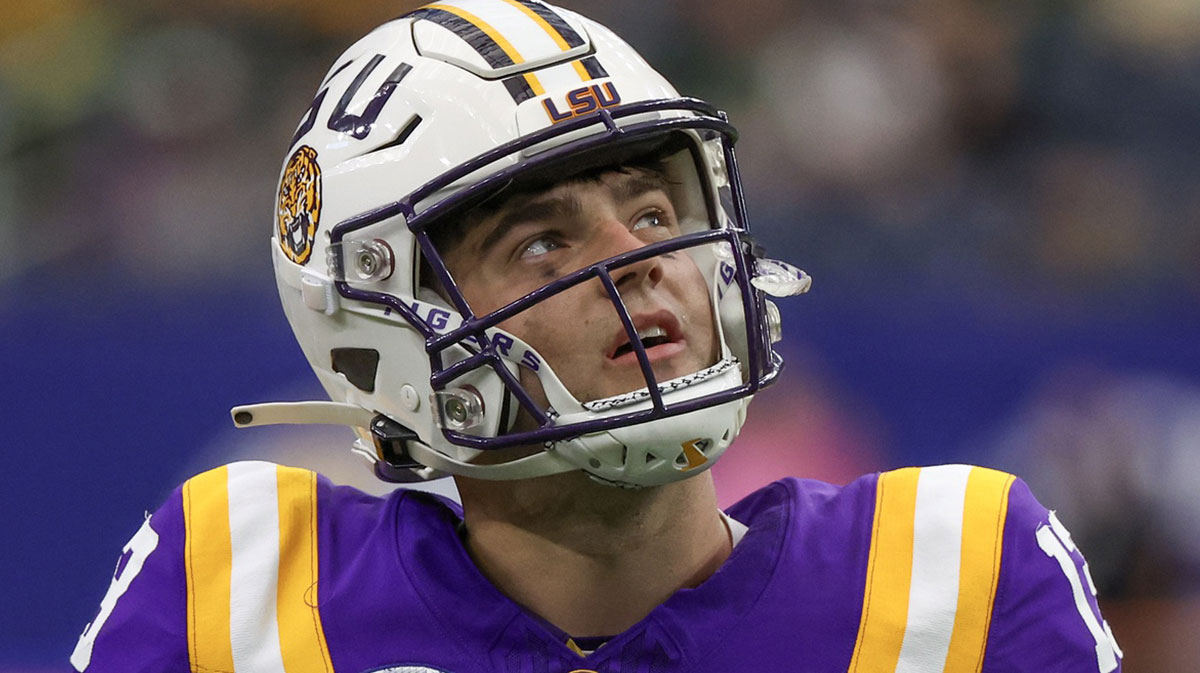LSU Tigers quarterback Garrett Nussmeier (13) looks at the scoreboard during an officials time-out against the Baylor Bears in the second quarter at NRG Stadium.