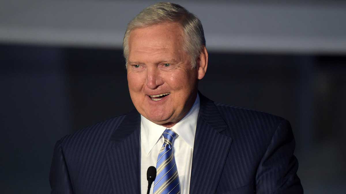 Lakers former player Jerry West speaks at a statue unveiling ceremony for Los Angeles Kings former player Luc Robitaille (not pictured) before the game against the Pittsburgh Penguins at Staples Center