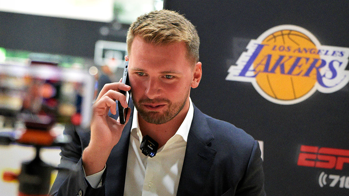 Lakers Luka Doncic (77) is interviewed by ESPN LA radio following a press conference announcing the signing of a 3-year, $165 million contract extension at UCLA Health Training Center