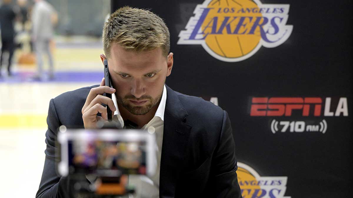 Lakers Luka Doncic (77) is interviewed by ESPN LA radio following a press conference announcing the signing of a 3-year, $165 million contract extension at UCLA Health Training Center