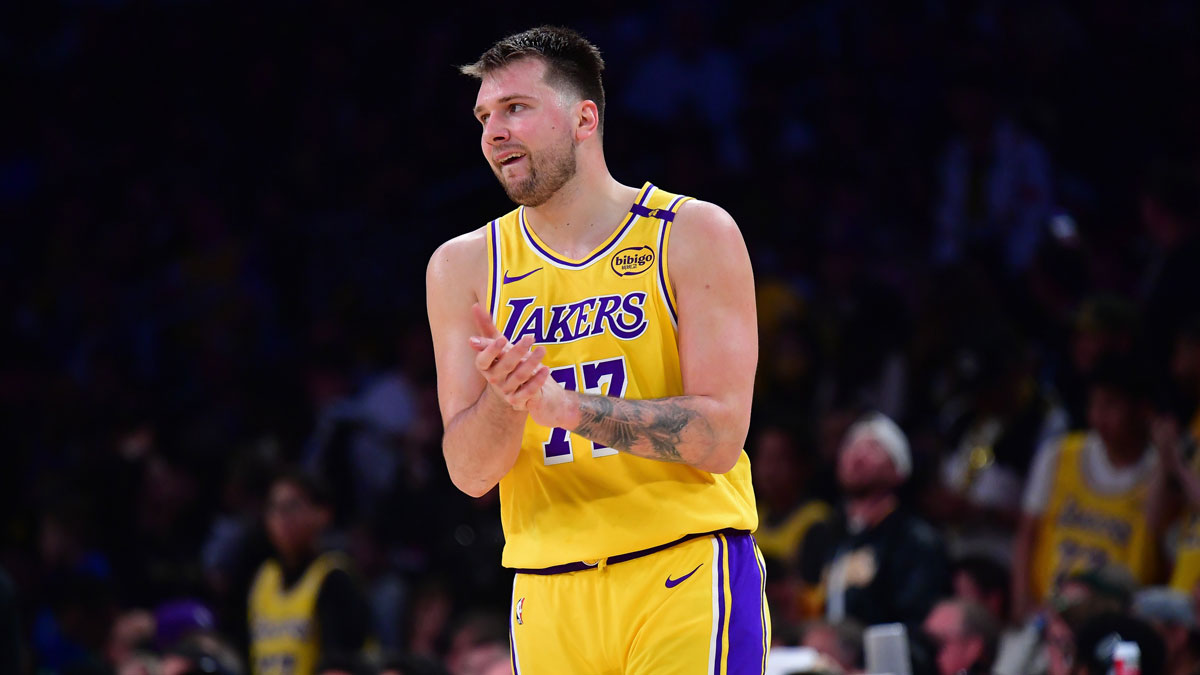 Lakers guard Luka Doncic (77) reacts during the second half in game five of first round for the 2025 NBA Playoffs at Crypto.com Arena with Lakers GM Rob Pelinka in the background