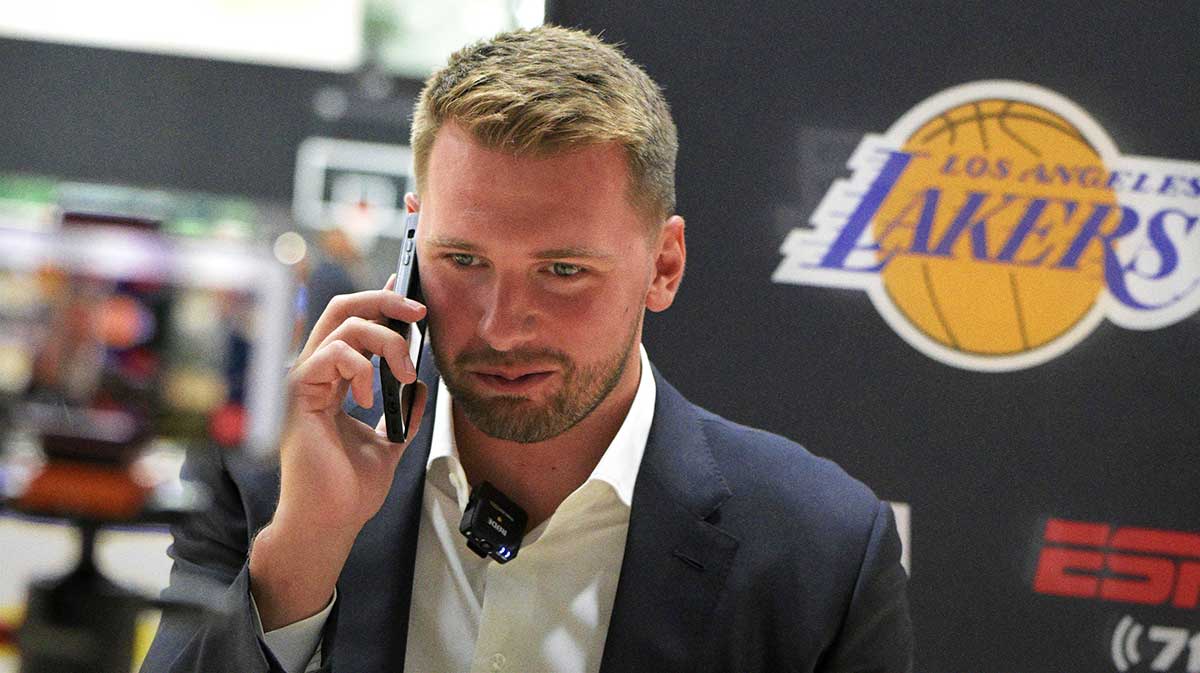 Lakers Luka Doncic (77) is interviewed by ESPN LA radio following a press conference announcing the signing of a 3-year, $165 million contract extension at UCLA Health Training Center
