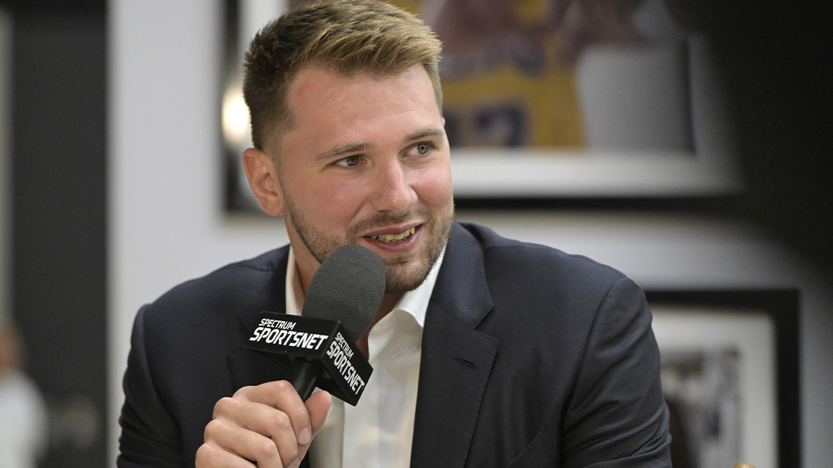  Lakers Luka Doncic (77) is interviewed Spectrum SportsNet following a press conference announcing the signing of his contract extension at UCLA Health Training Center