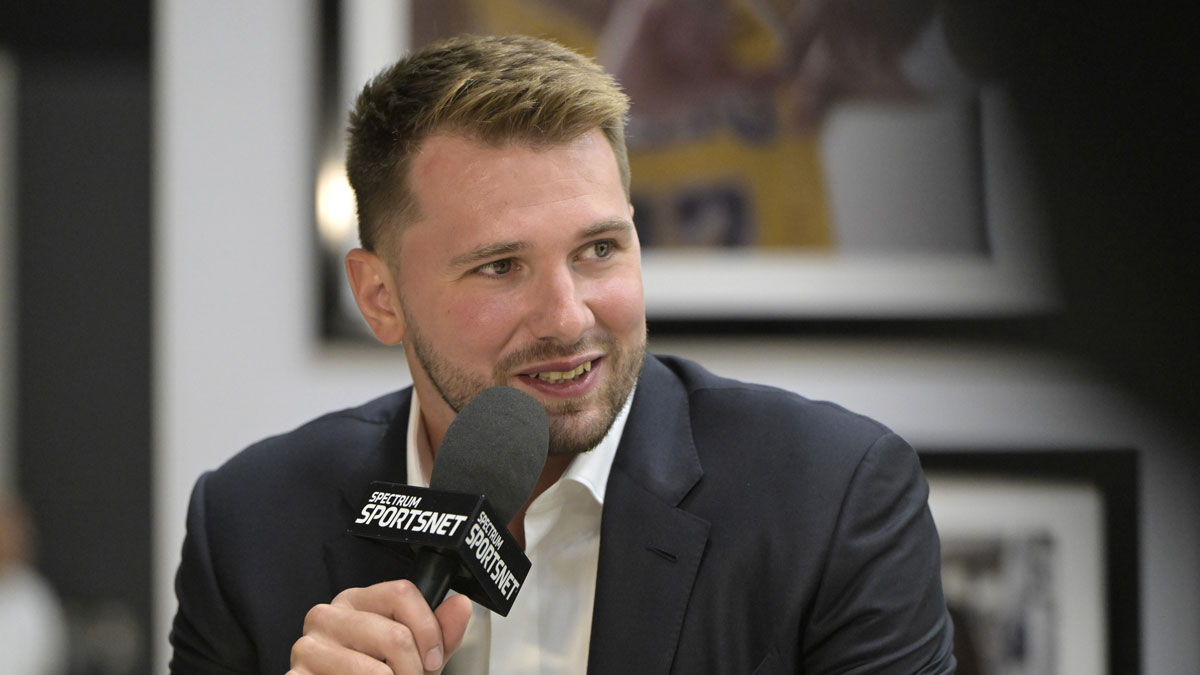 Lakers Luka Doncic (77) is interviewed Spectrum SportsNet following a press conference announcing the signing of his contract extension at UCLA Health Training Center