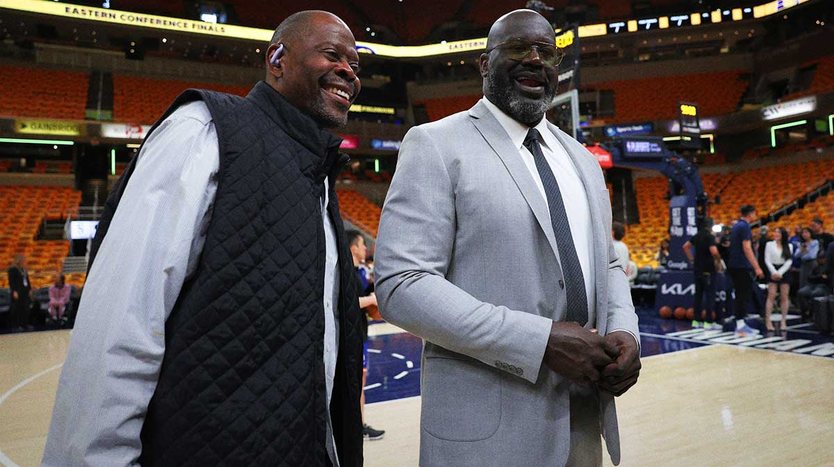 Shaquille O'Neal (right) talk prior to game three of the eastern conference finals for the 2025 NBA Playoffs at Gainbridge Fieldhouse.