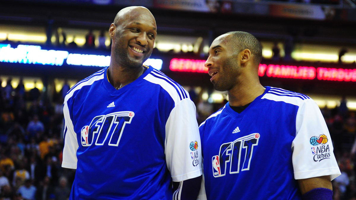 Los Angeles Lakers forward Lamar Odom (left) talks with guard Kobe Bryant against the Phoenix Suns at the US Airways Center. The Lakers defeated the Suns 99-95.