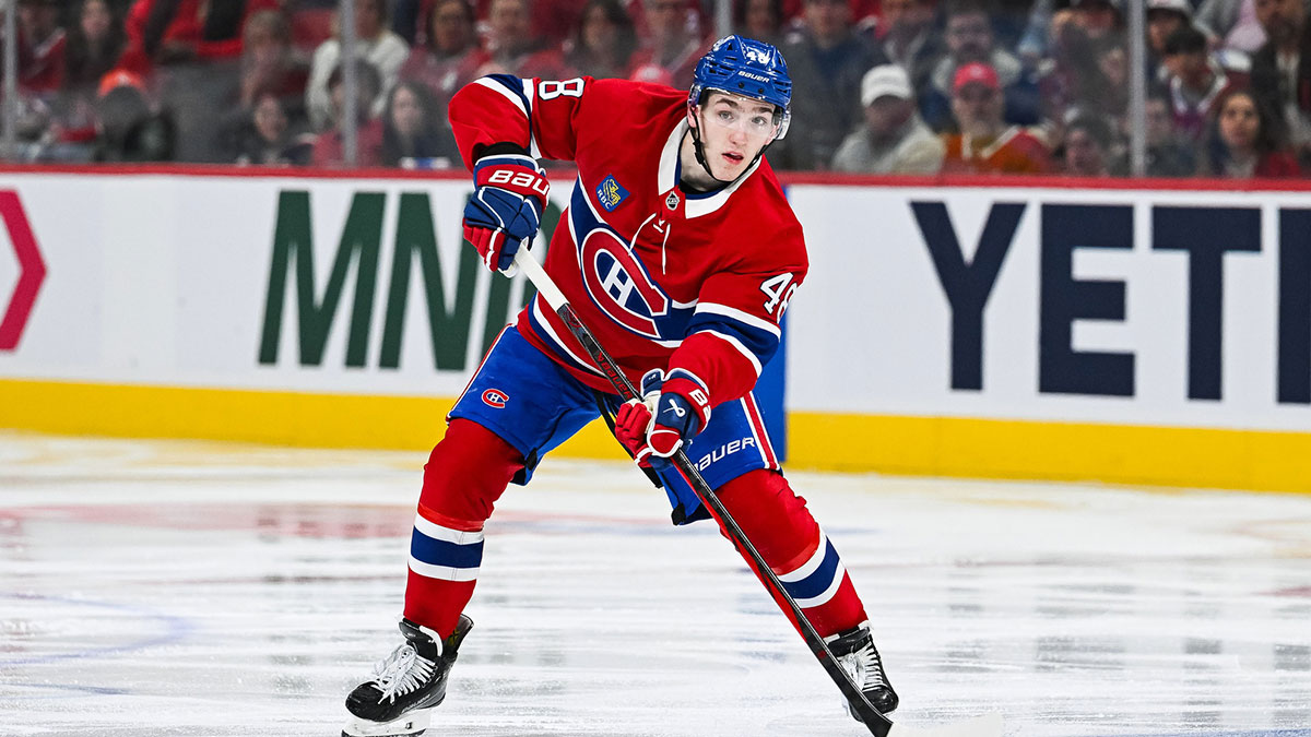 Montreal Canadiens defenseman Lane Hutson (48) considers his options with the puck against the Washington Capitals during the third period in game four of the first round of the 2025 Stanley Cup Playoffs