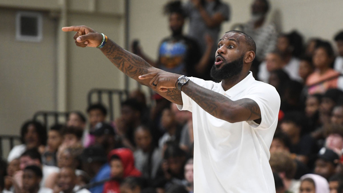 NBA star LeBron James coaches Strive for Greatness during the Strive for Greatness and Mokan Elite basketball game at the fourth day of the Nike Peach Jam at Riverview Park Activities Center.