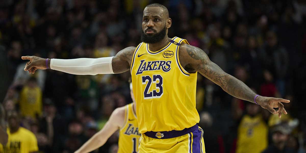 Los Angeles Lakers forward LeBron James (23) signals to teammates during the second half against the Portland Trail Blazers at Moda Center.