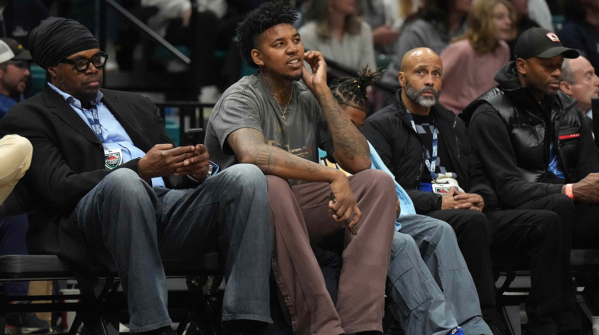 Dec 2, 2023; Las Vegas, Nevada, USA; Nick Young (center) watches during the Legends of Basketball Las Vegas Invitational between the Southern California Trojans and the Gonzaga Bulldogs at MGM Grand Garden Arena.