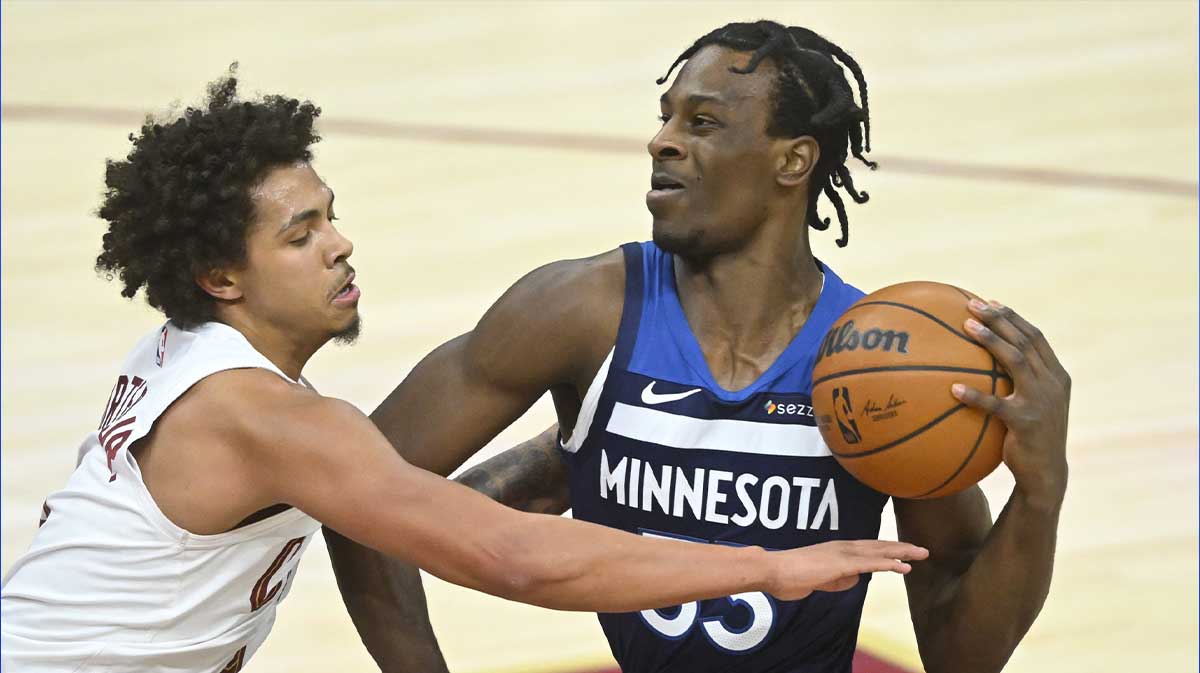 Cleveland Cavaliers guard Craig Porter Jr. (9) defends Minnesota Timberwolves forward Leonard Miller (33) in the fourth quarter at Rocket Mortgage FieldHouse.