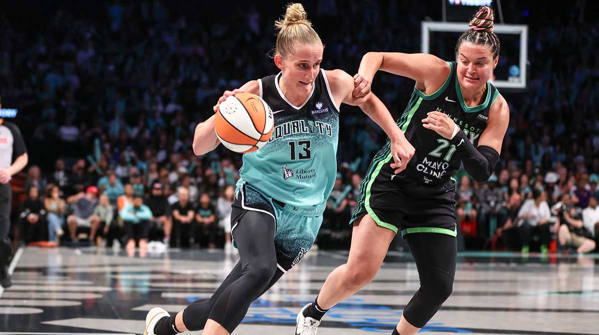 New York Liberty forward Leonie Fiebich (13) looks to drive past Minnesota Lynx guard Kayla McBride (21) in the third quarter at Barclays Center. 