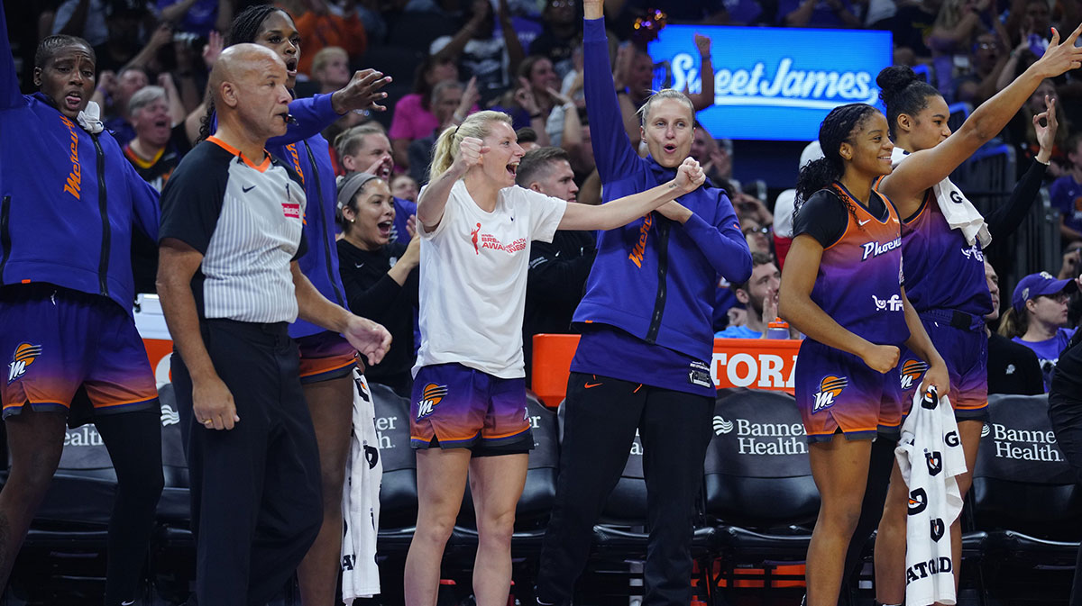 Mercury guards Lexie Held (center white) and Kitija Laska (center purple) celebrate a basket at PHX Arena in Phoenix on Aug. 7, 2025. 