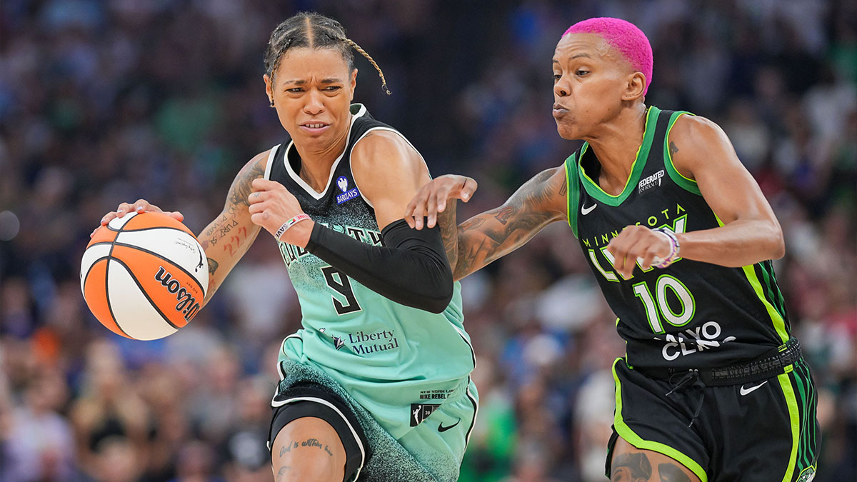 New York Liberty guard Natasha Cloud (9) dribbles against the Minnesota Lynx guard Courtney Williams (10) in the fourth quarter at Target Center.